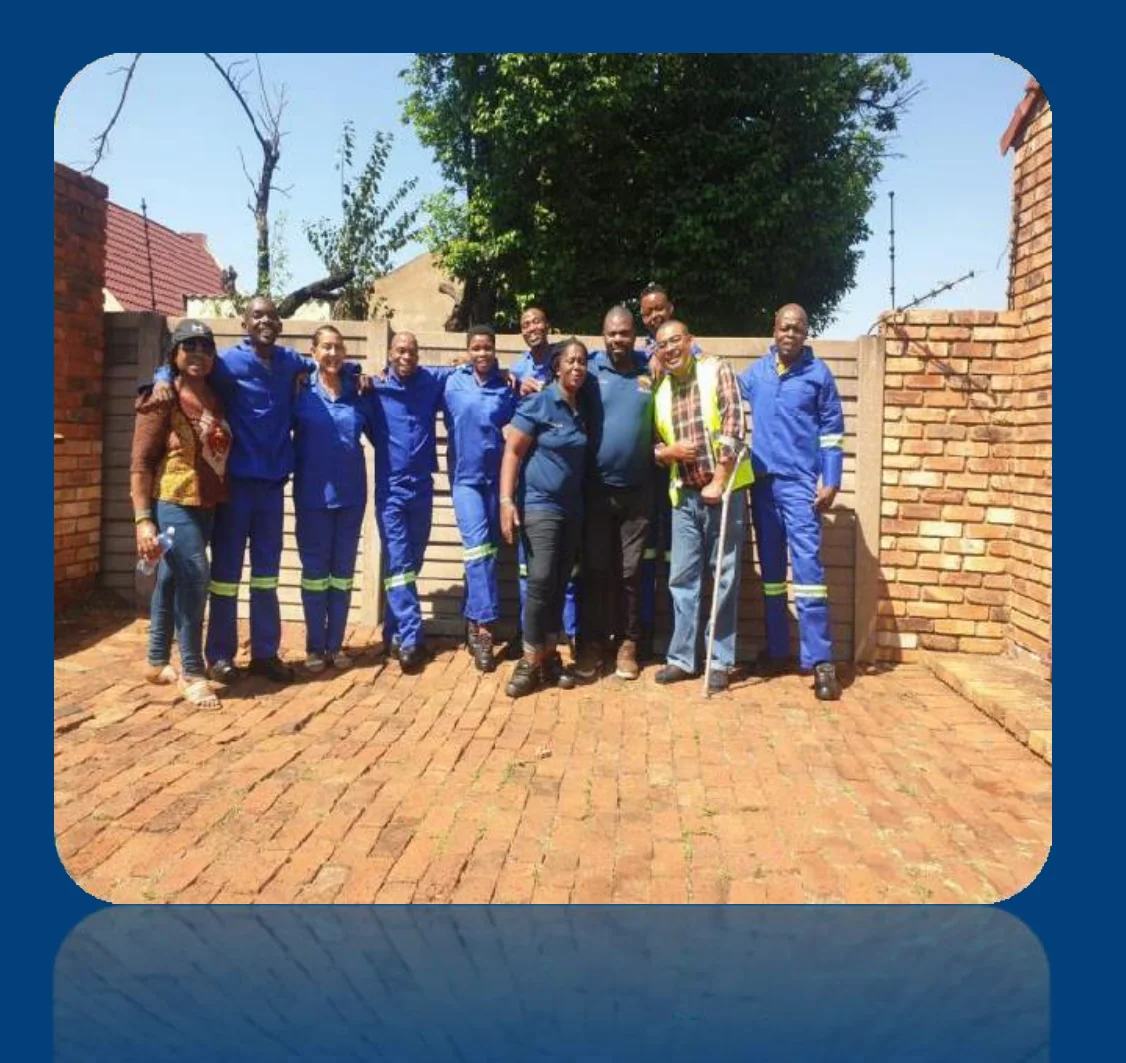 Pat and Lin site project crew with PPE
